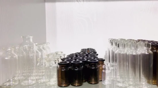 Frasco de vidrio moldeado farmacéutico ámbar transparente, viales de infusión de inyección de 50 ml, tipo USP I, II, III CE